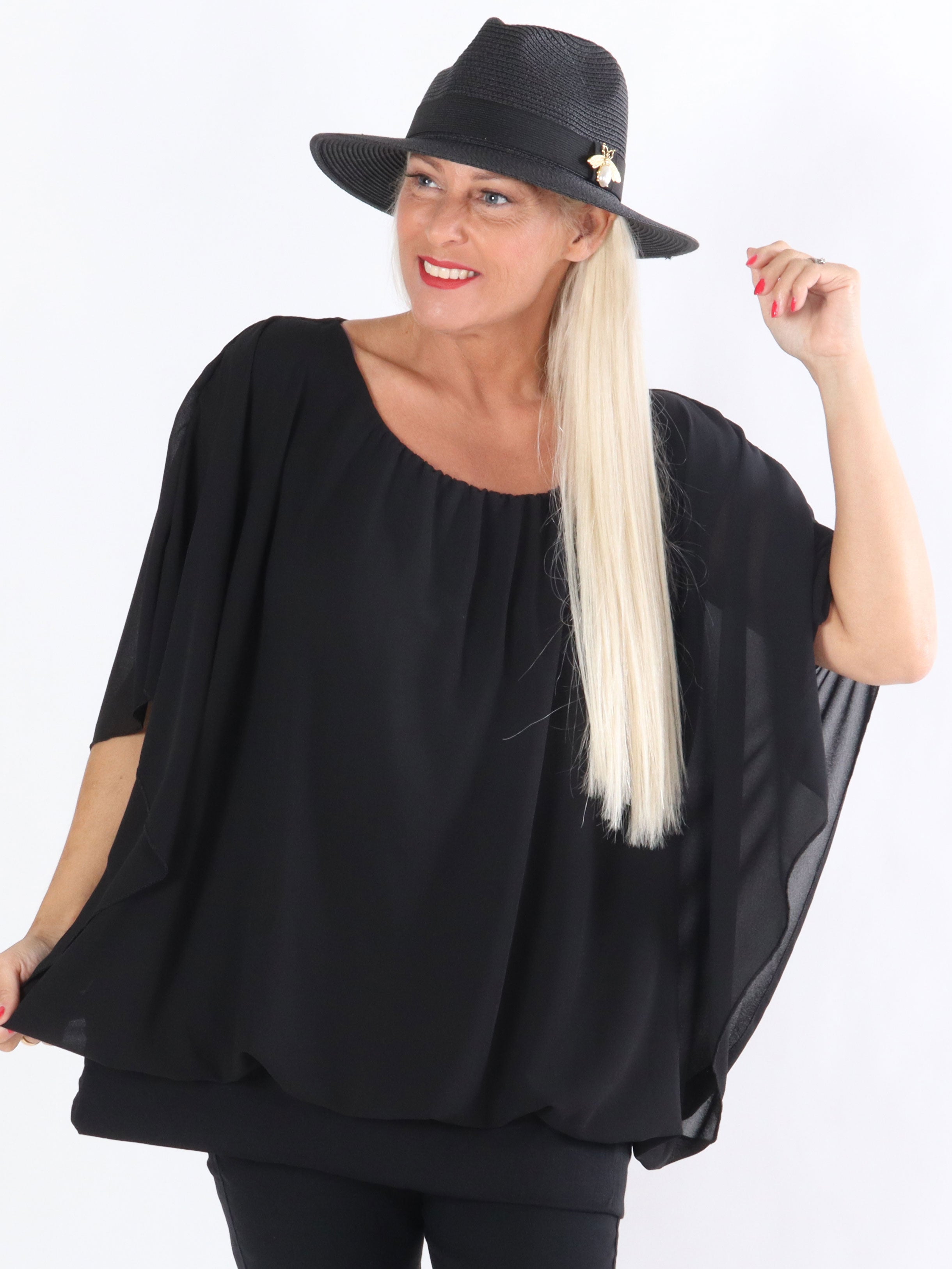 Cala - Elastisk topp med löst chiffongmaterial över